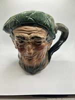 Front view of Royal Doulton Auld Mac jug