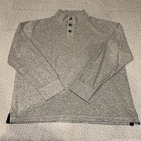 Full front view of gray Henley shirt