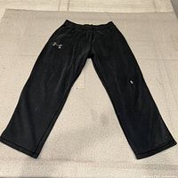 Full view of black sweatpants front side