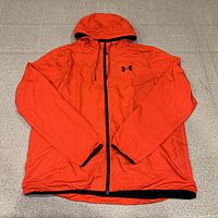Full view of jacket front showing color, hood, full-zip design