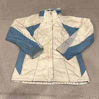 Full view of front of cream and blue Columbia jacket