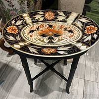 Platter resting on tripod stand showing overall set