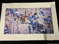 Full view of signed limited-edition digital print in sleeve