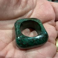 Top and interior view of green hardstone square ring