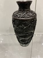 Full view of carved vase front profile