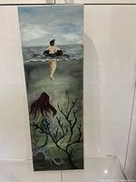 Full view of tall acrylic canvas showing swimmer and mermaid