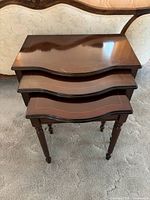 Three nested tables front view