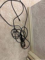Overall view of trouble light with coiled cord