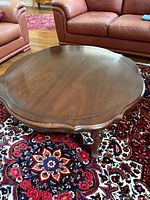 Full top view of the round cherry veneer coffee table