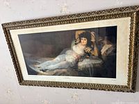 Full view of framed print on wall