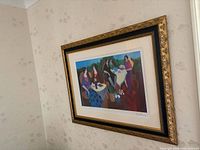 Full view of framed seriolithograph on wall