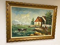 Front view of framed seascape painting