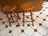 Pair of oak counter stools full view