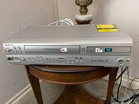 Front view of Venturer combo unit with cables resting on top