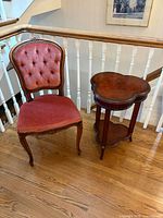 Full view of chair beside excluded table