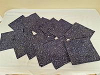 Full set of 12 patterned napkins laid out