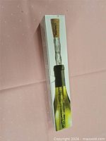 Front of sealed Corkcicle box showing full product image inserted in wine bottle