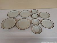 Top view of all 10 stoneware pieces showing counts and design