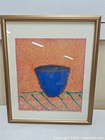 Full view of framed artwork showing image, mat and frame