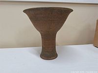 Full view of stoneware vessel