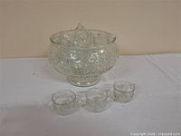 overall view of punch bowl with cups
