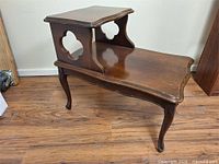 Full view of two-tier wood end table