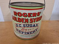 Front view showing Rogers' Golden Syrup logo and capacity