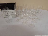Front view of all 12 wine glasses with box