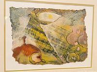 Front view of framed artwork showing image, mat, and frame