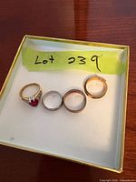 Four rings displayed in box