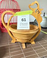 Basket standing open showing chicken shape and bowl