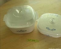 Both casserole dishes with lids visible
