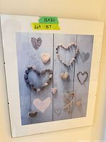 Front view of framed heart motif print
