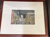 Full view of framed lithograph showing artwork, mat and frame