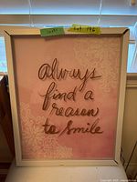 Full view of framed artwork showing quote and design