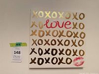Front view of canvas wall art next to size note 14x14