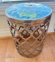 Full view of table showing mosaic top and lattice base