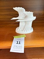 Front view of Royal Doulton porcelain geese figurine