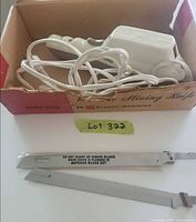 Knife handle with cord inside original box