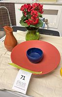 Group shot showing all ceramic pieces and floral arrangement