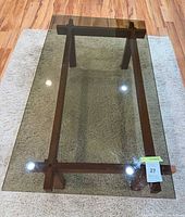 Top view showing smoked glass panel and teak base layout