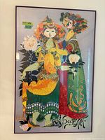 Full view of framed poster showing artwork, frame, and glazing
