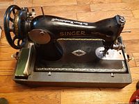 Top view of Singer 15K88 sewing machine on base