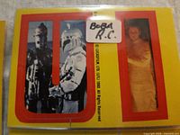 Sticker #21 showing IG-88, Boba Fett, Princess Leia on letter U