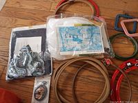 Assorted hoops, floss bundle, sealed kit packages