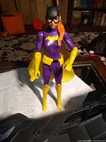Front view of Batgirl action figure standing