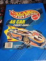 Front of blue Hot Wheels 48-car carry case