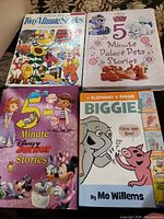 Front covers of main four hardcover storybooks