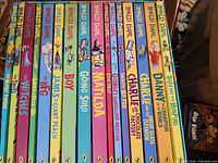 Spines of all 16 Roald Dahl paperbacks inside slipcase