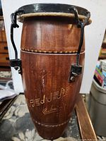 Front view showing carved logo and overall condition